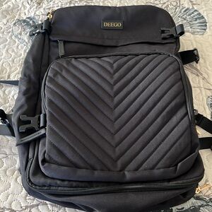 Backpack for so many things. Many compartments. Used one time. Black.